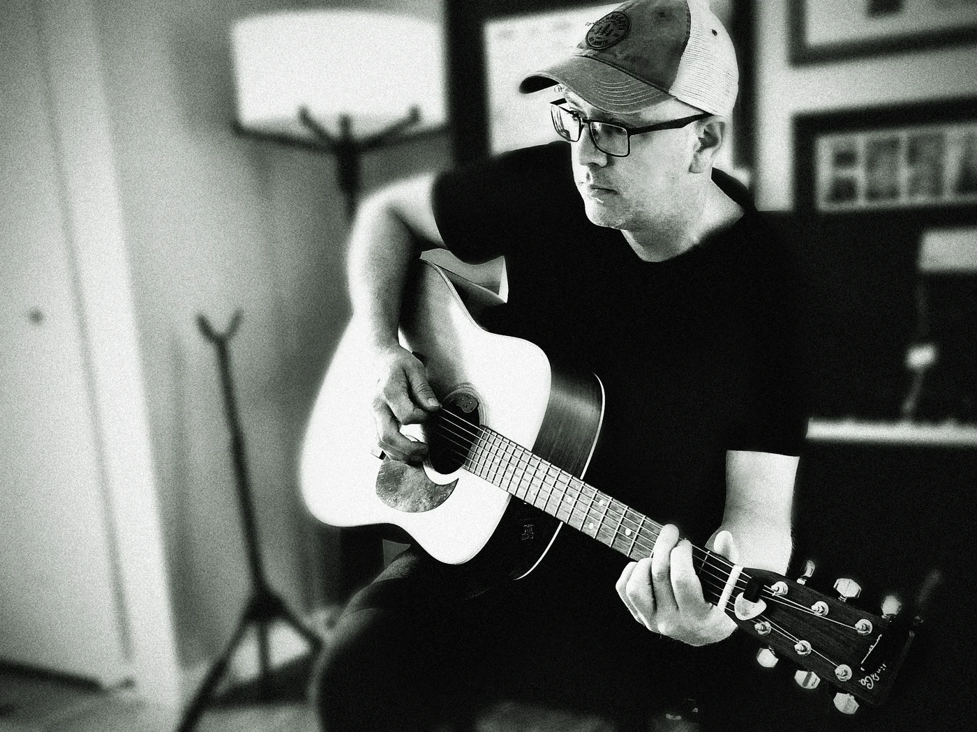 Hal Swift playing his acoustic guitar