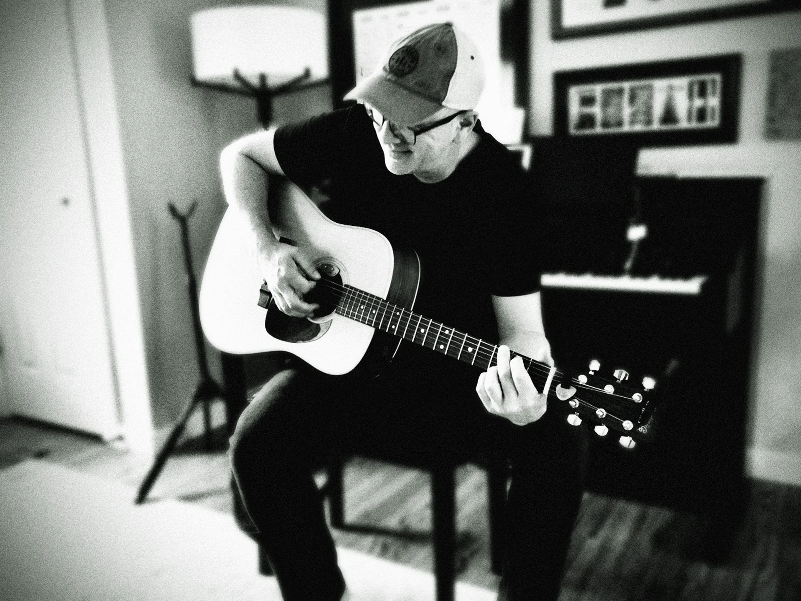 Hal playing his acoustic guitar